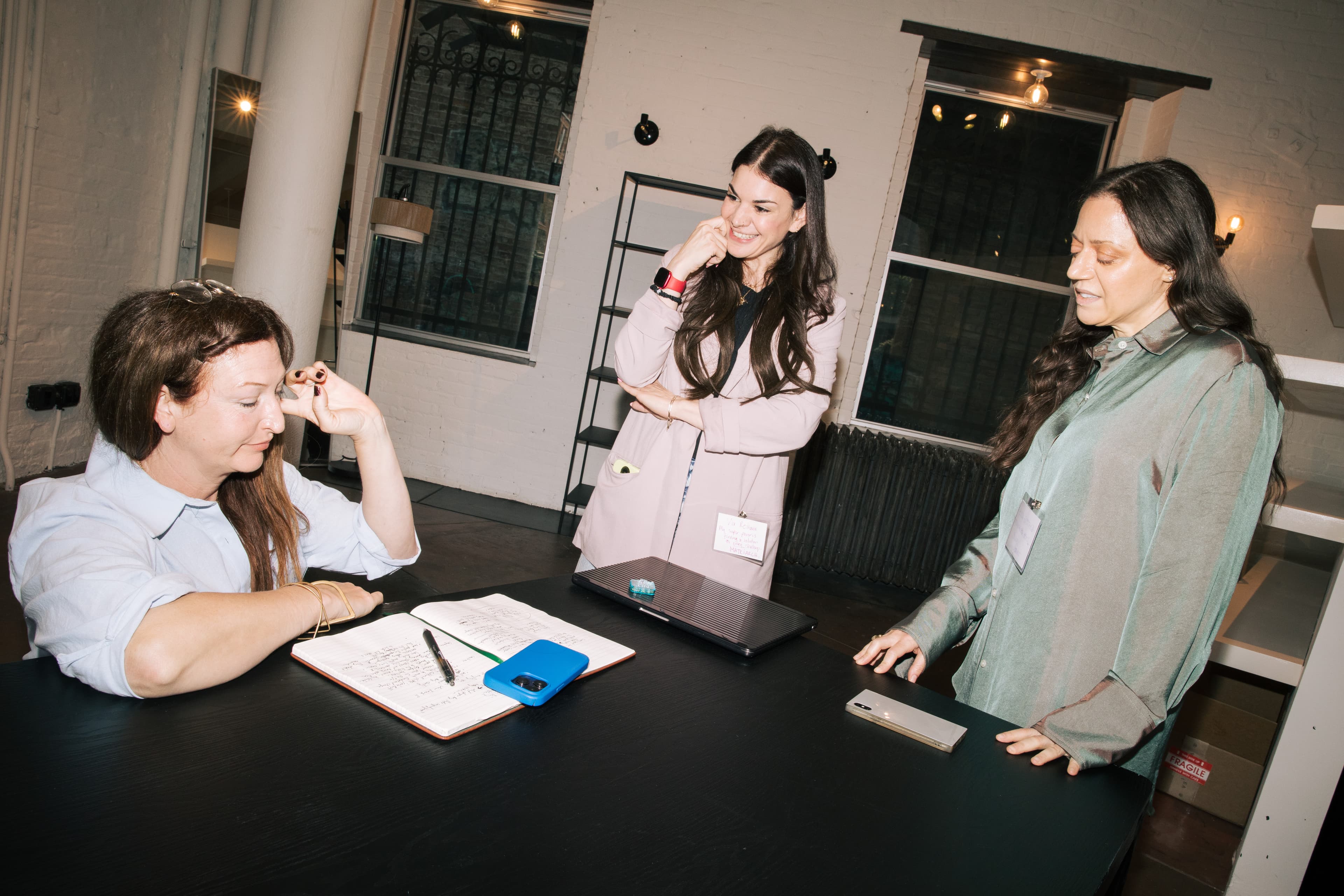Women working together during a live build